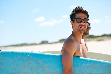 Image showing Beach, summer and surfboard with man friends outdoor together for travel, vacation or holiday trip overseas. Surfing, sea or fun with a young male surfer in sunglasses and friend bonding on the coast