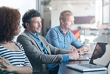 Image showing Business, meeting and listen or focus at office for entrepreneur with laptop at startup. Employees, together and brainstorming for a project with smile or watching in a creative company with tech.