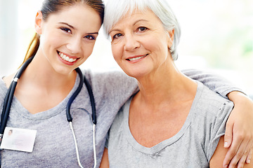 Image showing Smile, portrait of caregiver and elderly woman in nursing home, trust and support with doctor. Retirement, healthcare service and face of nurse with patient, happiness and medical check in house.