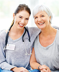 Image showing Senior care, happiness and portrait of nurse with old woman in nursing home, help and support from healthcare. Retirement, caregiver service and elderly patient with healthy smile on face in lounge.