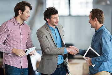 Image showing Business people, tech startup or handshake for deal, partnership or collaboration or congratulations. Shaking hands, meeting or happy employees in agreement for b2b success, welcome or thank you