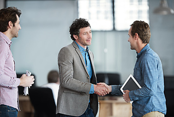 Image showing Business people, handshake and partnership, deal and welcome to office. Shaking hands, success and startup group in collaboration for b2b, promotion or hiring, work recruitment and congratulations