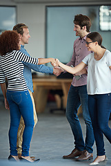 Image showing Handshake, success or business people in startup for collaboration, support or deal agreement. Group of men, happy women or team of creative employees shaking hands in a partnership or negotiation