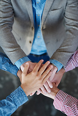 Image showing Collaboration, top view and hands together for cooperation, team building or solidarity. Teamwork, hand huddle and group of people with motivation, trust or support for community goals in partnership