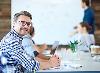 Image showing Project meeting, employee portrait and happy man listen CEO presentation, sales pitch or investment ideas. Collaboration, strategy and office businessman, client or team work on group financial plan