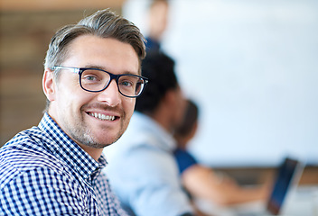 Image showing Face, portrait of a businessman and in a modern conference room of his workplace with a smile. Health wellness or happiness, business meeting and professional male person in a boardroom at his work