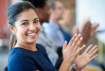 Image showing Face portrait, audience applause and happy woman, business team or crowd at presentation, event or trade show. Community, celebrate or row of people clapping for speaker, speech or support motivation