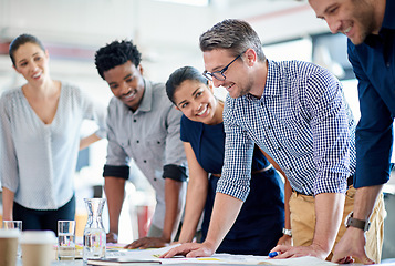 Image showing Team, creative and staff in a meeting, cooperation and planning with ideas, discussion and collaboration. Male person, leader and happy group with partnership, support and solidarity with innovation