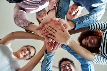 Image showing Portrait, business and group with hands together, stack and cooperation with collaboration, teamwork and partnership. Face, staff or team building with support, solidarity and motivation with success