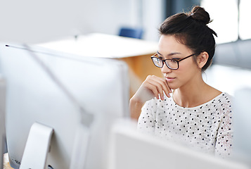 Image showing Business, thinking and woman with a computer, focus and connection with online reading, copy writer and creative. Female person, employee or consultant with a pc, search internet and editing project