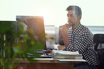 Image showing Computer, focus and business man in office for research, creative and planning. Thinking, professional and technology with male employee on digital agency for startup, email and website designer