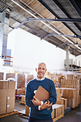 Image showing Delivery, smile and portrait of man in warehouse for cargo, storage and shipping. Distribution, ecommerce and logistics with employee in factory plant for supply chain, package or wholesale supplier