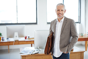 Image showing Senior business man, portrait and executive at creative startup with smile, confidence and modern office. CEO, success and career mindset, happy male professional in management at advertising company