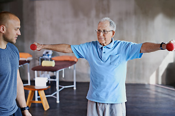 Image showing Physiotherapist help, senior man and weight training for health and wellness therapy in retirement. Healthcare, physio and workout for recovery with a dumbbell for medical exercise and elderly person