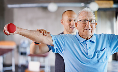 Image showing Physiotherapist, senior man and weight training for health and wellness therapy in retirement. Healthcare, physio and workout for recovery with a dumbbell for medical excuse and elderly male person