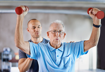 Image showing Physiotherapist, senior man exercise and weight training for health and wellness therapy in retirement. Healthcare, physio and workout for recovery with dumbbell for medical excuse and elderly person