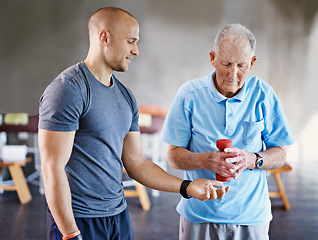 Image showing Physiotherapist, senior man patient and weight training for health and wellness therapy in retirement. Healthcare, physio and workout for recovery with dumbbell for medical rehab and elderly person