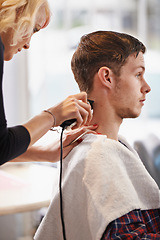 Image showing Hair care clipper, hairdresser and woman cut client hairstyle, grooming and cleaning in beauty salon. Hairdressing machine, service and studio person, customer or man for healthy haircare treatment