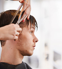 Image showing Hair scissors, man and hairdresser hands cutting hairstyle, grooming and cleaning in studio salon. Hairdressing cosmetic tools, stylist service or profile of people, customer or client for treatment