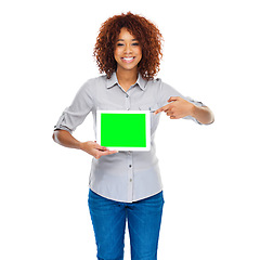 Image showing Woman, green screen tablet and gesture in studio for social media app, review and mockup by white background. Isolated african lady, model and portrait for web design job, space and smile for promo