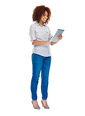 Image showing Isolated woman, texting and tablet in studio for social media app, contact and communication by white background. Young african lady, model and touchscreen for web design job, smile and connectivity
