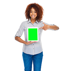 Image showing Woman, pointing and green screen tablet in studio for social media app, review and mockup by white background. Isolated african lady, model and portrait for web design job, space and smile for promo
