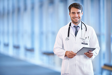 Image showing Portrait, healthcare and tablet with a doctor man standing in a hospital corridor for research or insurance. Medical, trust and technology with a male medicine professional in a clinic for health