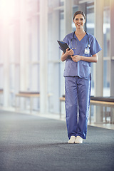 Image showing Female nurse, portrait and stethoscope with chart at the hospital for results or details for surgeon. Clipboard, nursing and healthcare at a medical centre with smile in the hallway with notes.