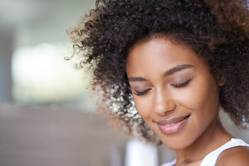 Image showing Smile, skincare and woman in a bathroom for makeup, cosmetic and treatment against a blurred background. Happy, face and African female person relax in her home with beauty, hair or self care routine