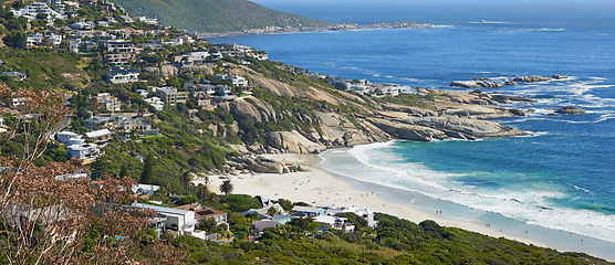 Image showing Mountain, beach and aerial of city by ocean in South Africa for tourism, traveling and global destination. Landscape, background and view of sea by urban town for adventure, vacation and holiday