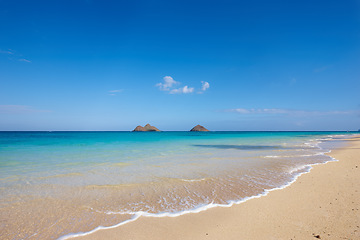 Image showing Water, beach and ocean landscape with clouds in the sky or travel to a tropical paradise, dream vacation or island holiday, Hawaii, summer wallpaper and relax in nature, sun and blue sea waves