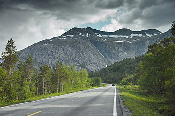 Image showing Road, mountain and travel landscape, trees and nature with direction and destination with asphalt and highway. Environment, street and location with journey and traveling view outdoor with horizon