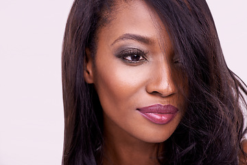 Image showing Makeup, black woman and face with beauty in studio for cosmetics, eyelash or hair extension. Headshot of african female model on a pink background for facial shine, skin glow and luxury aesthetic