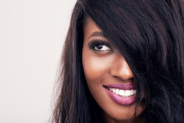 Image showing Hair, beauty and face of black woman in studio for makeup, human extensions or cosmetics. Headshot of african female model smile on a white background thinking of salon mockup, skin glow or skincare