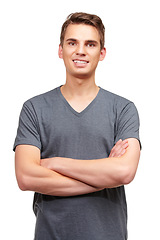 Image showing Fashion, crossed arms and portrait of happy man in studio with confidence, attractive and pride on white background. Smile, style and face of isolated handsome male person with trendy casual clothes