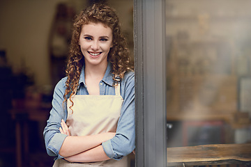 Image showing Smile, arms crossed and portrait of woman at restaurant for small business, coffee shop or waiter. Entrepreneur, happy and space with female barista at front door of cafe for diner in food industry
