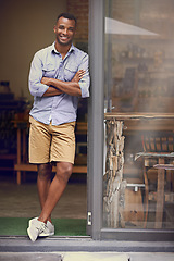 Image showing Black man, coffee shop and portrait of small business owner at front door with a smile. Entrepreneur african person as manager in a restaurant for hospitality service, career pride and startup goals