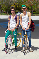 Image showing Bicycle, portrait and friends or men in city streetwear for college, university or outdoor travel in carbon footprint. Happy youth or people with gen z fashion, bike for transport at a park or campus