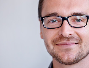 Image showing Portrait, mockup and man with glasses, optometry and guy against a white studio background. Face, male person and model with eyewear, clear vision and optometry with sight, looking and see with eyes