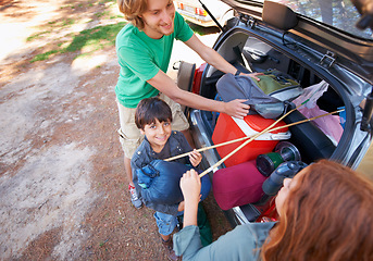 Image showing Happy family, road trip and packing car trunk for camping, holiday or vacation above in nature outdoors. Top view of dad or kids getting ready for travel, camp adventure or getaway together in forest