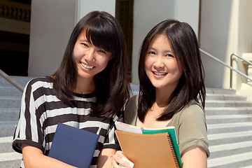 Image showing College, happy and portrait of girl friends with scholarship standing outdoor on campus for education. Knowledge, smile and Japanese female university students by a school building in the city.