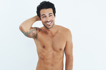 Image showing Portrait, muscular and man with fitness, body and happiness against a white studio background. Face, male person and model with a smile, confident and healthy lifestyle with wellness and workout goal