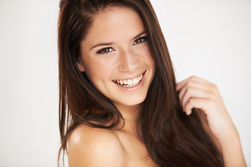 Image showing Portrait, beauty and smile with a model woman in studio on a white background for natural skincare. Face, happy and cosmetics with an attractive young female person posing for luxury skin treatment