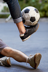 Image showing Street soccer, fitness and legs of people with a ball for sports, training or cardio. Shoes, sport and feet of men playing football in the road for a workout, exercise or action together for a game