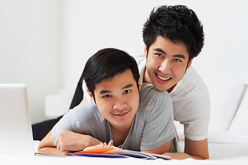 Image showing Portrait, lgbt and love with an asian couple learning together in their home while bonding over education. Study, happy or smile with a gay man and partner in a house, studying as university students