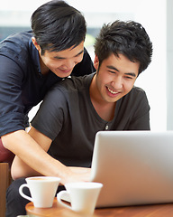 Image showing Happy, streaming and a gay couple with a laptop for a movie, internet search or reading email. Smile, love and Asian men with a computer for online information, movie choice or show together