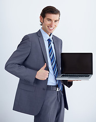 Image showing Corporate man, laptop screen and thumbs up in portrait, like opinion and mockup space by white background. Businessman, funny entrepreneur and computer with good news, vote and promo for brand review