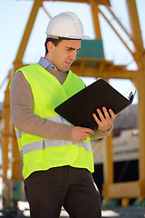 Image showing Documents, construction site and man for inspection, reading building information or compliance folder outdoor. Engineering, architecture and person with industry checklist of project management