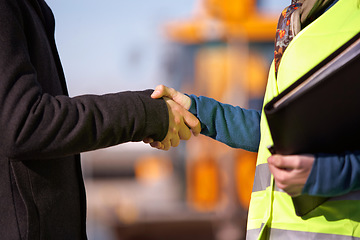 Image showing Construction site, handshake and people in industry partnership, thank you and success or engineering deal. B2b, building contractor and architecture meeting of business person shaking hands closeup