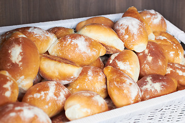 Image showing Flour bread, food and bakery basket of rolls from cooking, catering service, breakfast or baking meal at cafe. Bunch of fresh baked or crispy roll snack for eating, nutrition or fiber in restaurant